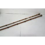2 x Bamboo Tribal Staffs, brass mounts, each 1.75m h approx
