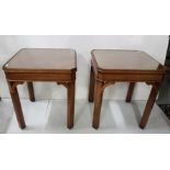 A pair of figured walnut lamp tables on chamfered supports, each 18" sq
