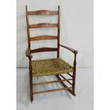 Plantation style walnut Rocking Chair, waved ladder back, with weaved rope seat, 62cm wide