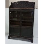 Victorian oak Bookcase, a carved upper gallery over 4 glass door fronted cupboards and 2 open