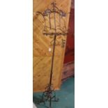 Adjustable wrought iron lectern/music stand, painted brown, 1.75m h x 42cm w approx