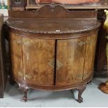 Early 20th C Walnut Bow Front Drinks Cabinet, with rope-edged top, decorative brass escutcheons