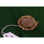 Large 9ct Gold Victorian Mourning Brooch, the decorative heart-shaped border surrounding a glass