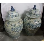 Matching Pair of Blue and White Bulbous Vases with lids, decorated with Chinese Landscape Scenes,