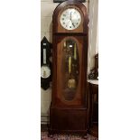 Early 20th century mahogany longcase clock with oval bevelled glass door, the circular silvered