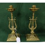 Matching pair of ornate Adam's Style cast brass Candlesticks, lyre central designs, each 26cm h (2)