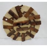 Display of wooden rebate and rolling Planes, 95cm dia