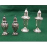 A Pair of English Silver Pepper Pots, ovid-shape with waved detail (stamped), 9cm high & a Pair of