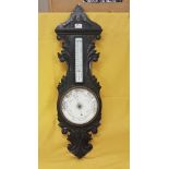 Victorian carved oak cased aneroid barometer / thermometer