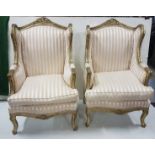 Matching Pair of Carved Gilt Wood Framed Armchairs, beige and cream fabric upholstery (each 115cm