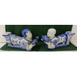 Pair of Chinese replica figures of reclining serving figures, each 30cm w