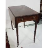 A mid-19th c mahogany Pembroke table with an end drawer & faux on the reverse, raised on ring turned