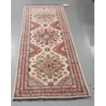 Persian Floor Runner, beige ground, with red and green highlights, 77m x 1.85m