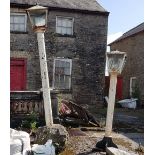 Pair of tall Cast Iron Outdoor Lanterns on pillars, painted white