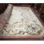 Fine and very large bespoke “Donegal Carpets” Hand-Tufted Wool Carpet, mauve ground, with floral