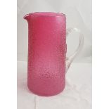 Victorian tall cranberry Glass Water Jug, with a frosted design and ribbed clear glass handle, 26cm