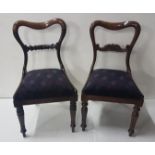 2 x Early Victorian rosewood Dining Chairs, with shaped top rails, carved mid rails and turned legs,