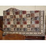Beige ground Kashmir Rug, all over floral and urn patterns, in square shaped panels, 3.3m x 2m
