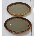 Matching pair of oval framed gilt reproduction Wall Mirrors, bevelled inserts, 66cm h x 40cm w (2)