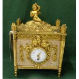 Small brown marble cased Mantel Clock in an ornate gilt frame with reeded shape outer columns and