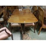 Extending Mahogany Dining Table, oval ends, on a twin pillar base, mid 20th C (1 removable leaf)