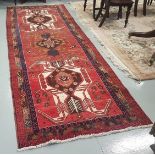 Washed red ground Persian Hariz Runner, probably antique, 3.33m x 1.16m