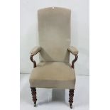 Victorian mahogany framed Armchair with high back, C scrolled arms, turned front legs, brass