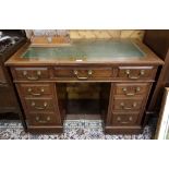 Early 20th C walnut Knee Hole Desk, tooled green leather top, 1.08m w x 61cm d x 75cm h