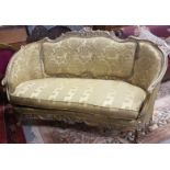 Continental carved wood and gilt decorated Couch with curved side arms, floral mouldings, curved