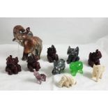 Group of miniature Elephant Ornaments including one set of 4 teak, one pair of silvered seated