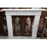 Early Victorian Regency Design White Marble Fireplace 53”w with raised panel to the frieze, 1.36m