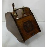 An Edwardian walnut coal box with carved panelled front & brass handle