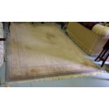 A pair of woollen Floor Rugs, each beige and terracotta with green borders, each 1.85m x 2.9m (2)