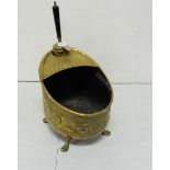 Victorian nicely embossed brass coal scuttle on claw supports with integral shovel