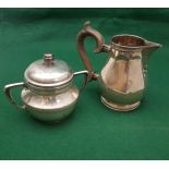 Georgian Silver Cream Jug with segmented sides and a turned mahogany handle 11cm high & an Italian