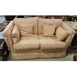 Peter Guild Parker Knole type sofa, having floral rust coloured damask upholstery with loose