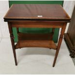 Small Edw. Mahogany and inlaid fold-over card table raised on square tapering supports with under-