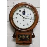 “Fireman’s” Wall Clock, in a walnut case, 8-day movement, with swaying fireman caricatures within