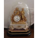 A French ormolu & alabaster Mantle Clock, housed under a glass dome, mounted with a figure of a man,