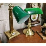 A brass single column desk lamp with green glass shade, pivoting head, 40cm h & a similar brass desk