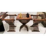 Reproduction walnut chess table, with a matching pair of hamlet style crossover chairs (3), also