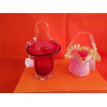 Two Victorian ornate Glass Baskets – one red with clear glass floral feet and one pink glass with