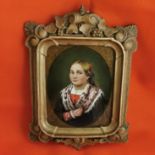 Miniature Oil on Paper, oval portrait of a possibly Bavarian girl in traditional costume holding a