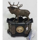 Black Marble Mantle Clock with a marble dial and grey columns, mounted with a figure of Spelter