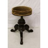 Walnut revolving piano stool, Brass hilt, adjustable