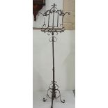 Adjustable wrought iron lectern/music stand, painted brown, 1.75m h x 42cm w approx