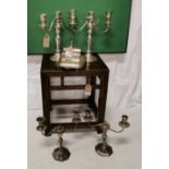 Two pairs of silver-plated candelabra and a Walker and Hall plated cheese dish (5)