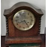 Mantel Clock in a rope edged oak case and with bevelled glass, 30cm x 29cm