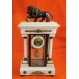 19thC White Marble and brass mounted Mantle Clock, the top mounted with bronze figure of roaring