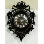 Black Forest French Movement Vineyard Clock, with applied enamelled Roman Numerals to the face,